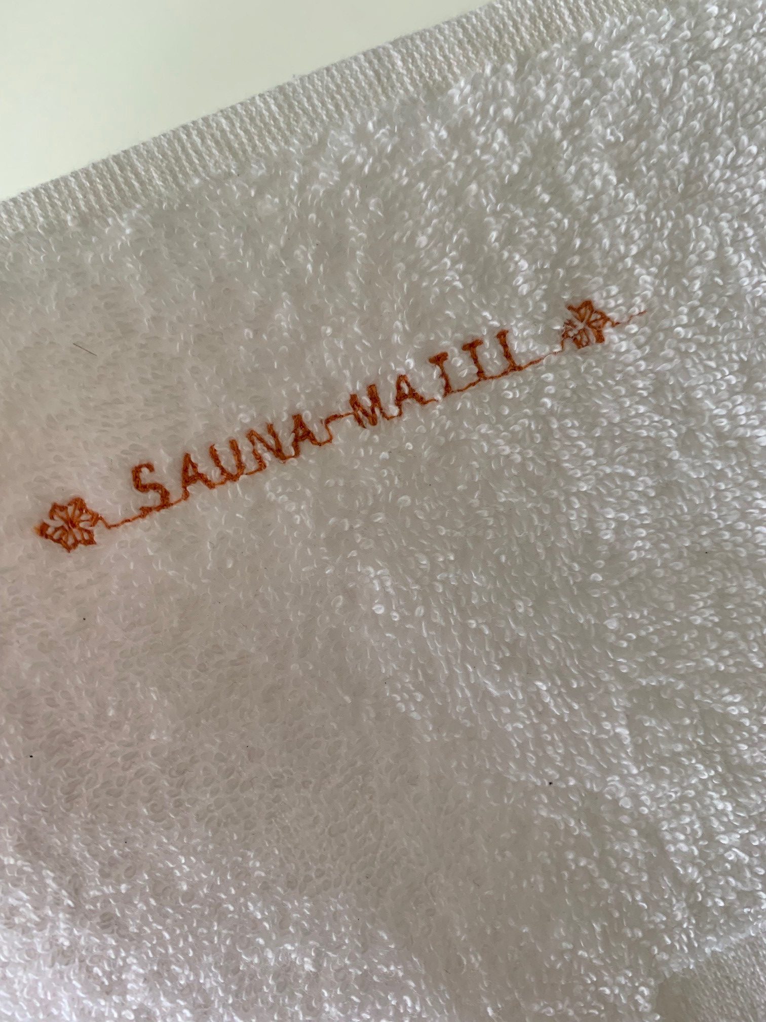 sauna-matti-aufgusstuch-weltmeister-mit-stickerei image 2